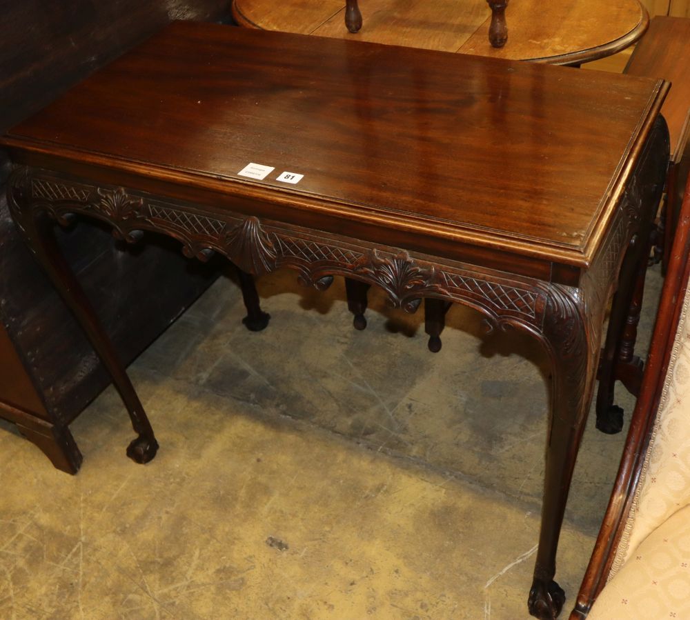 An 18th century style Irish design mahogany serving table, with shell carved frieze, on cabriole legs, W.95cm